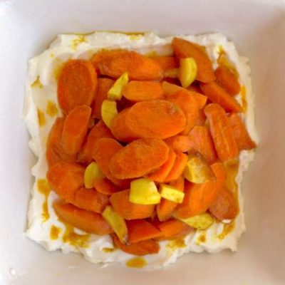 curried carrots over yogurt